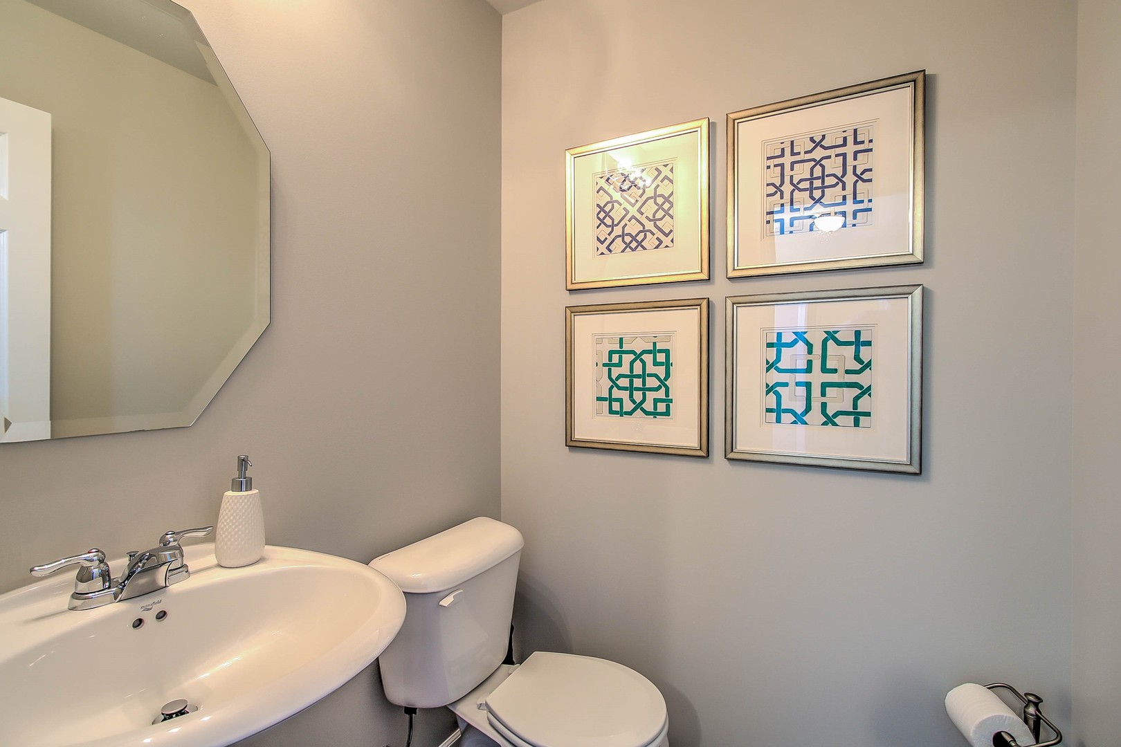 1030 Sharp Drive Plano, IL 60545 - Photo 23 of 36 a bathroom with a toilet a sink and a window
