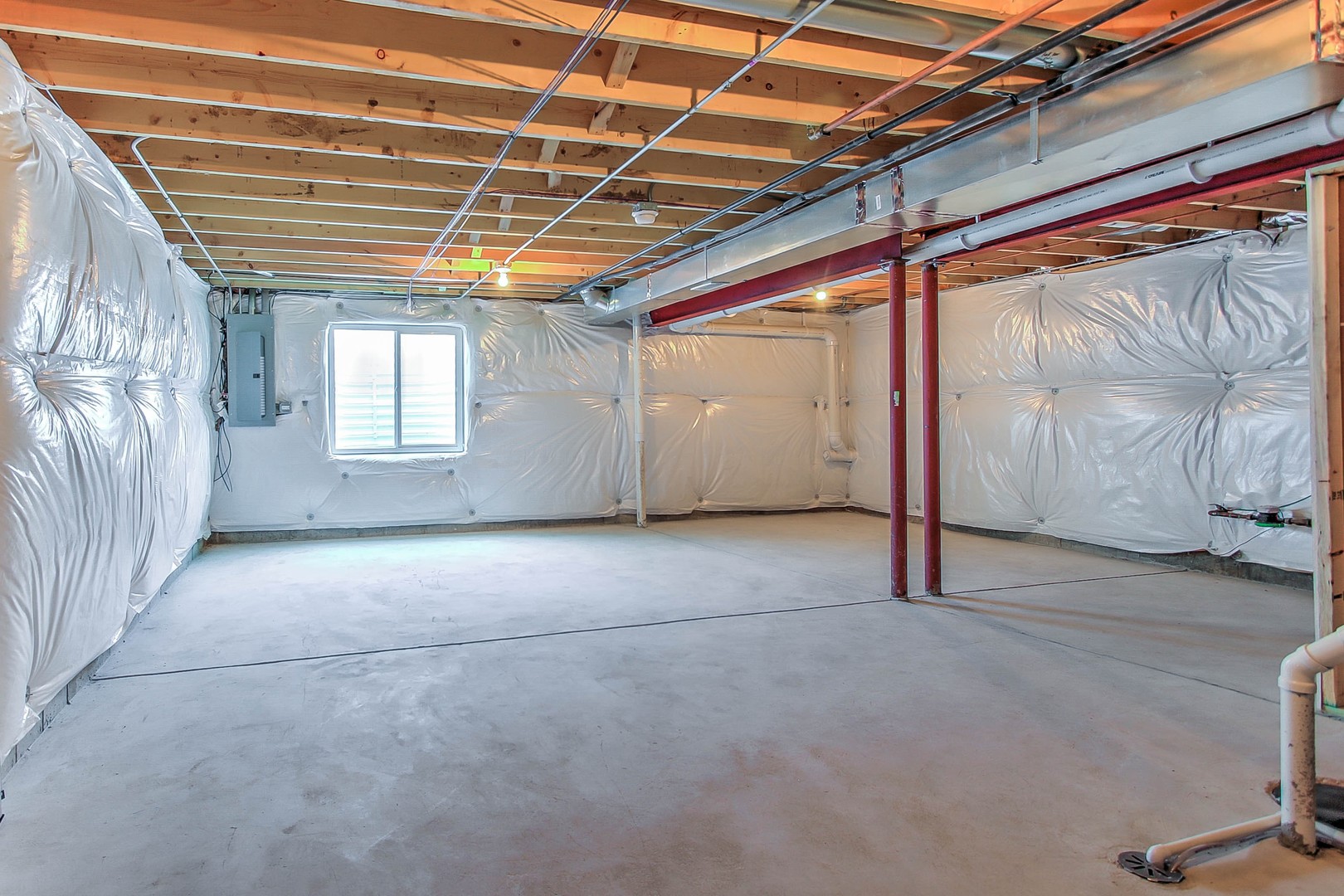 1030 Sharp Drive Plano, IL 60545 - Photo 25 of 36 a view of a room with wooden walls and windows