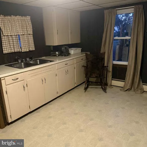 a view of room with washer and dryer