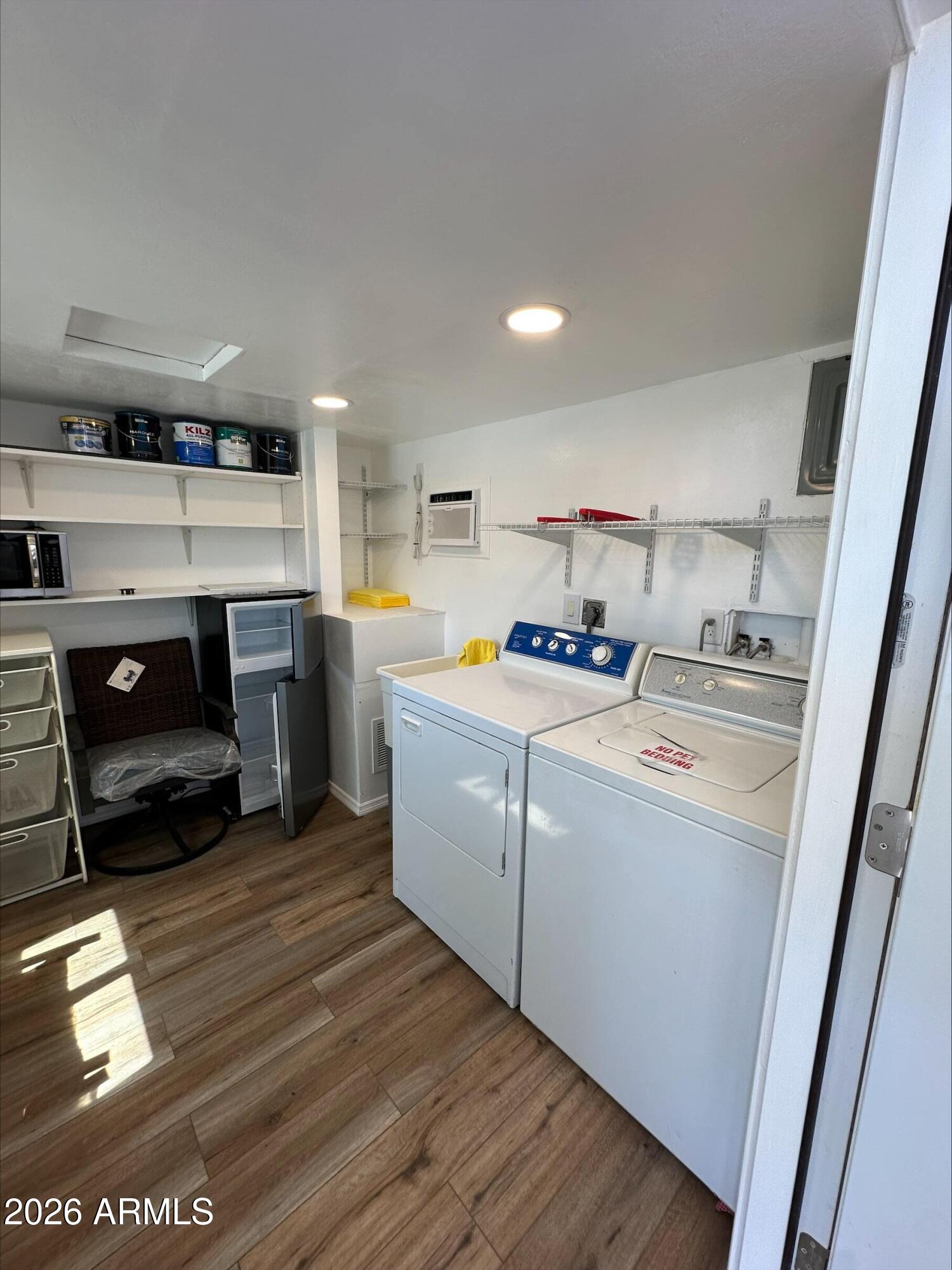 17200 West Bell Road, Unit 1104 Surprise, AZ 85374 - Photo 3 of 6 a utility room with washer and dryer