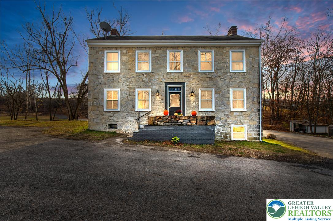4828 Huckleberry Road Orefield, PA 18069 - Photo 16 of 41 a front view of a house with a yard