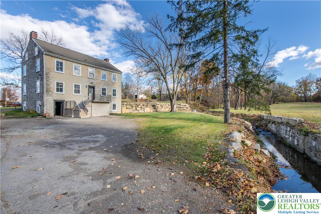 4828 Huckleberry Road Orefield, PA 18069 - Photo 6 of 41 a view of a house with a yard