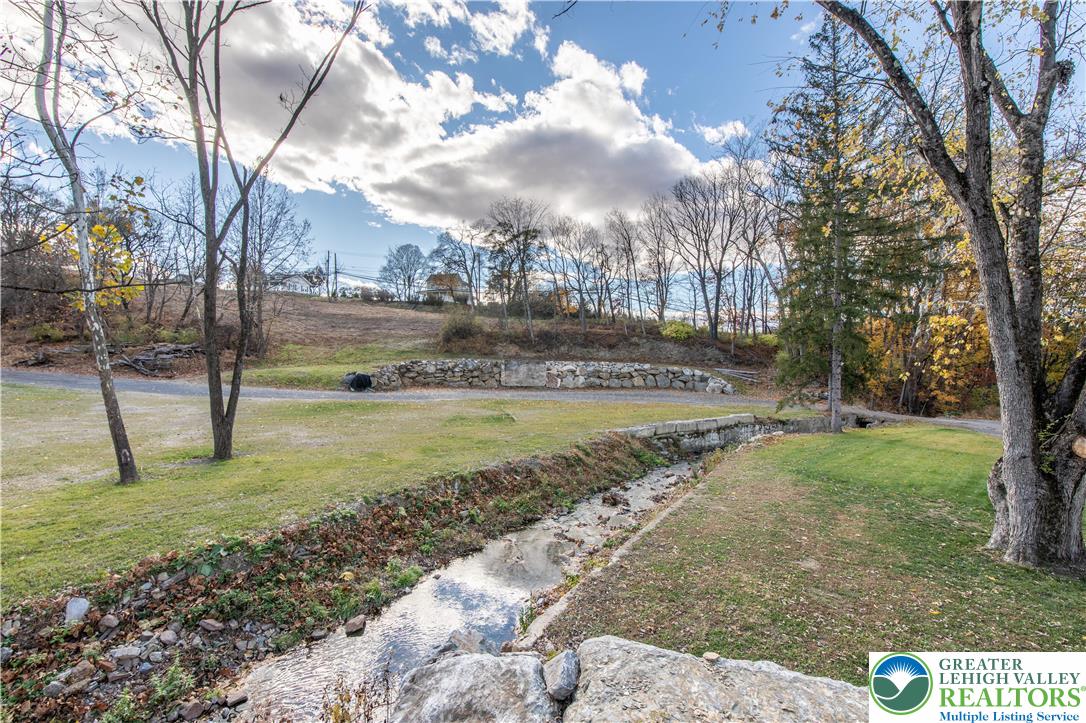 4828 Huckleberry Road Orefield, PA 18069 - Photo 8 of 41 a view of a yard with swimming pool