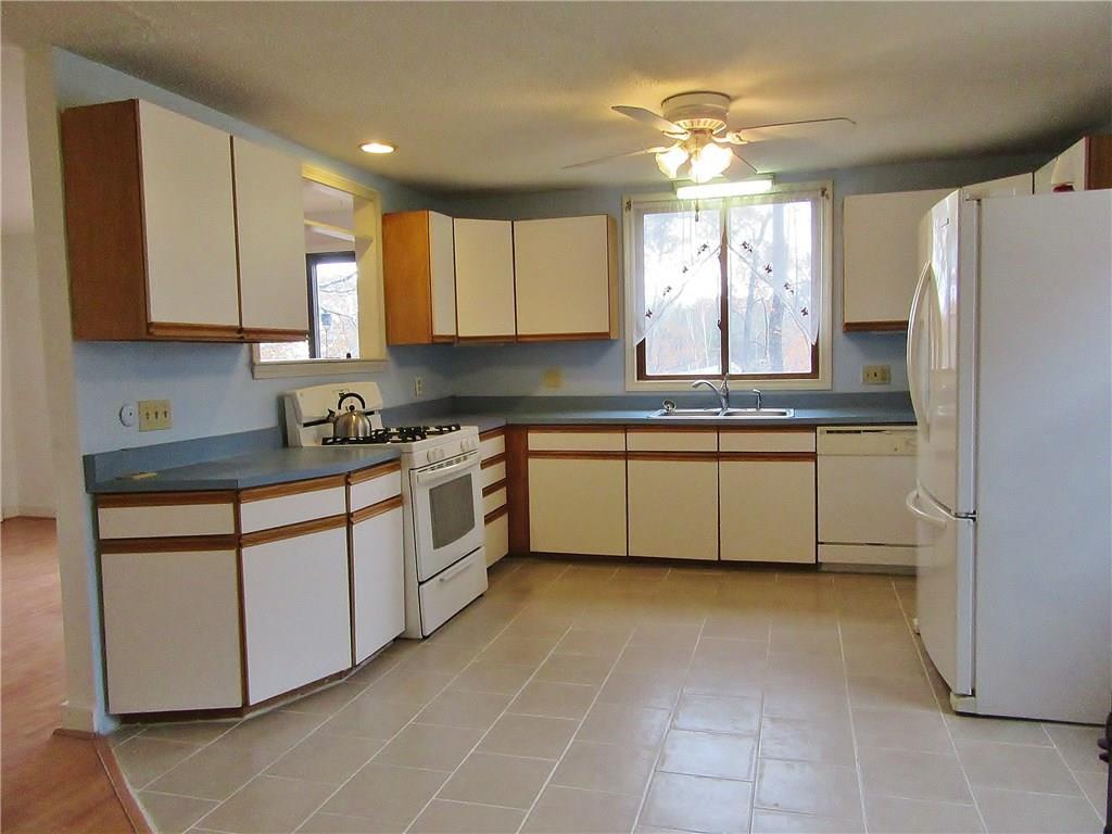 328 Quaker Ridge Road Casco, ME 04015 - Photo 10 of 31 Bright and sunny kitchen!