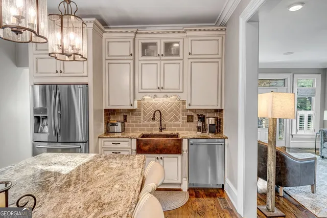 a bedroom with a bed and a fireplace