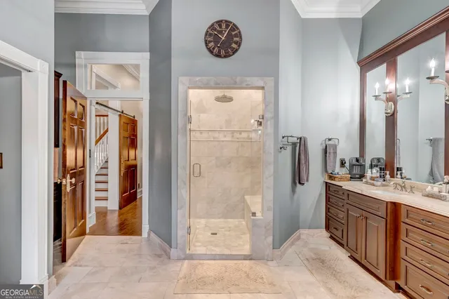 a front view of a house with a large window