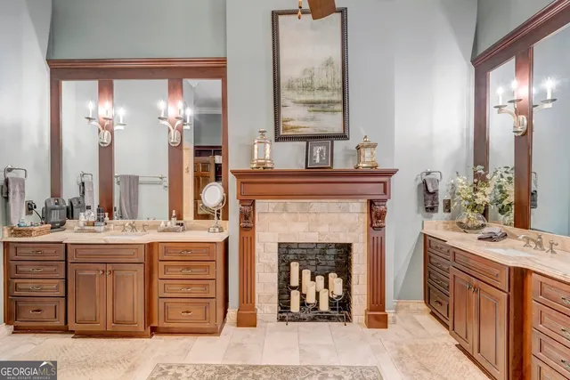 a view of a house with a yard and potted plants