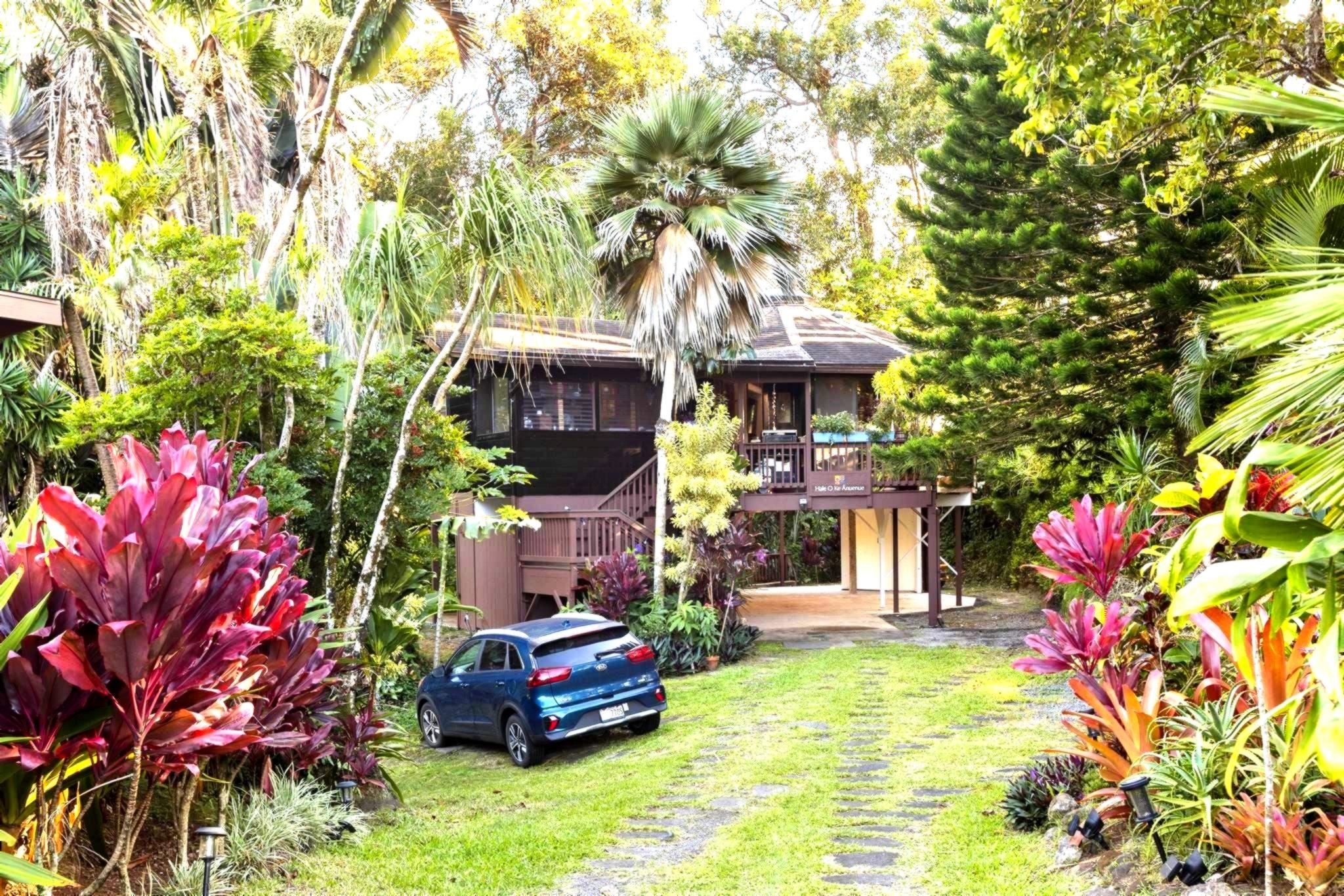 105 East Kuiaha Road Haiku, HI 96708 - Photo 9 of 24 a front view of a house with yard