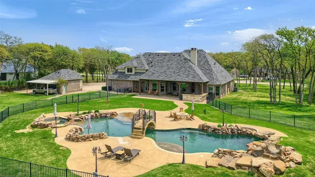 front view of a house with a garden and pathway