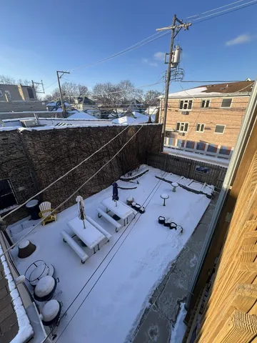 a view of a terrace with furniture