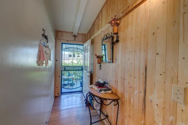 a view of room with furniture and a window