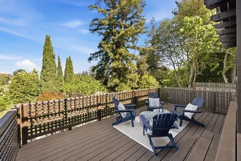 a view of balcony with furniture