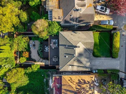 a aerial view of a house with a garden and plants