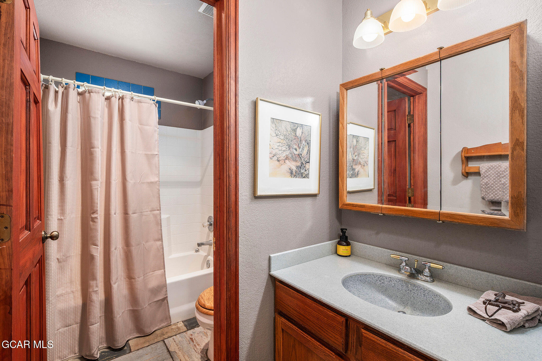 732 Gcr 8311/ Clayton Ranch Road Tabernash, CO 80478 - Photo 46 of 65 a bathroom with a sink vanity mirror and a bathtub