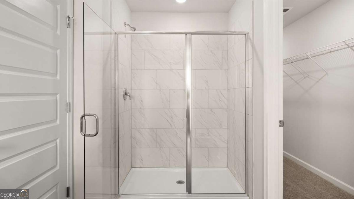 289 Sound Circle Stockbridge, GA 30281 - Photo 45 of 67 a bathroom with a shower