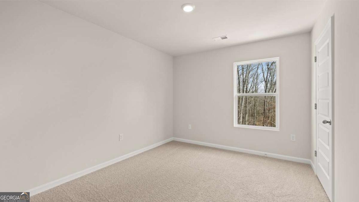 289 Sound Circle Stockbridge, GA 30281 - Photo 53 of 67 an empty room with a window