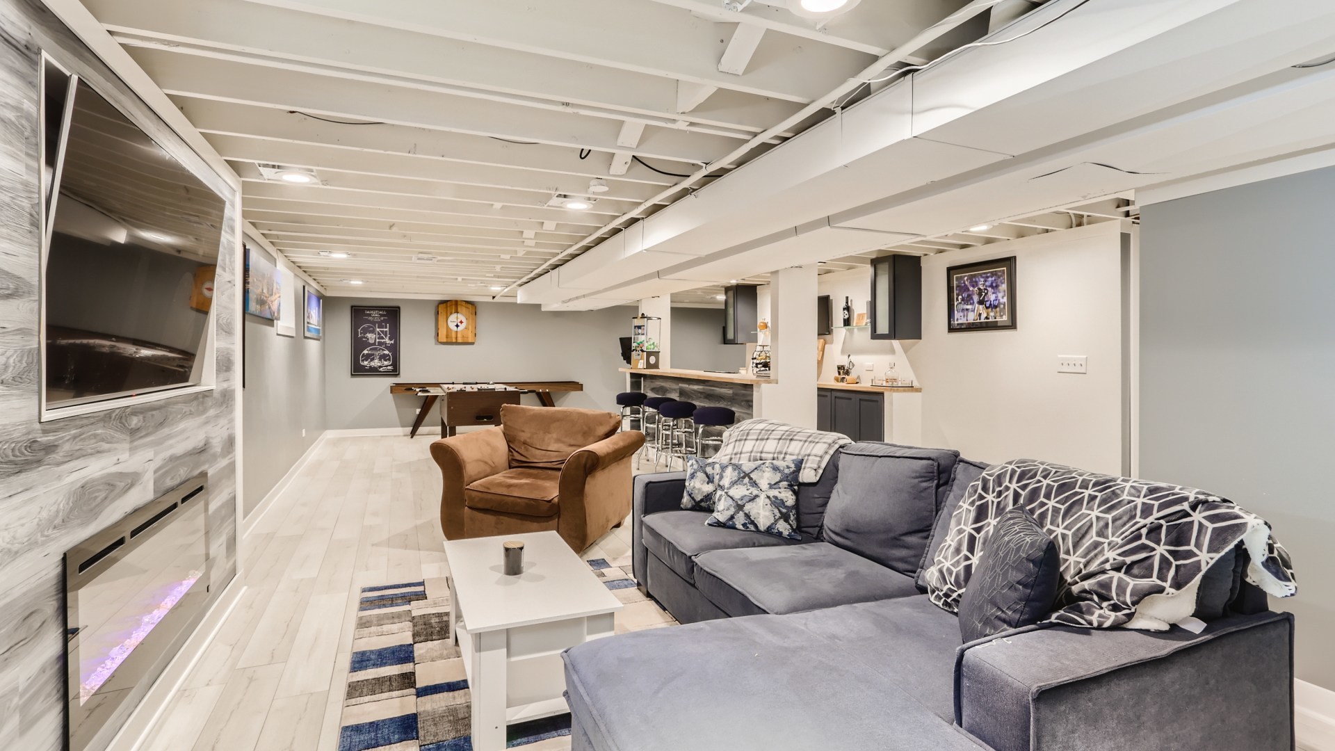 112 South Mt Prospect Road Mount Prospect, IL 60056 - Photo 21 of 27 a living room with furniture and a flat screen tv