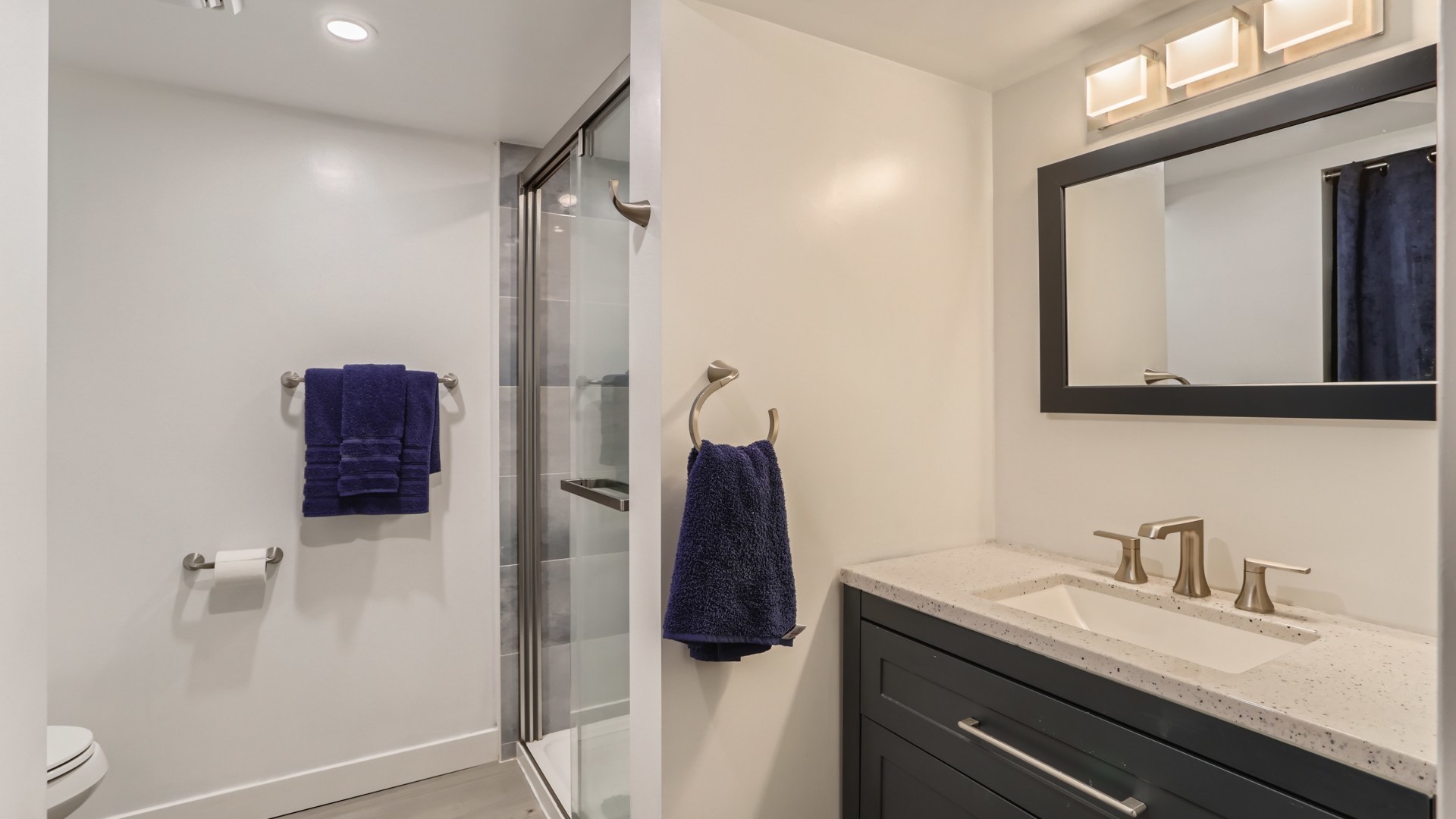 112 South Mt Prospect Road Mount Prospect, IL 60056 - Photo 23 of 27 a bathroom with a granite countertop sink and a mirror