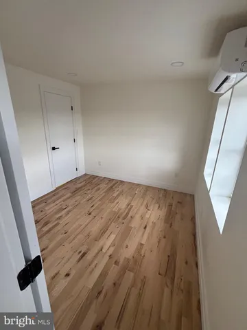 a view of a hallway view with staircase