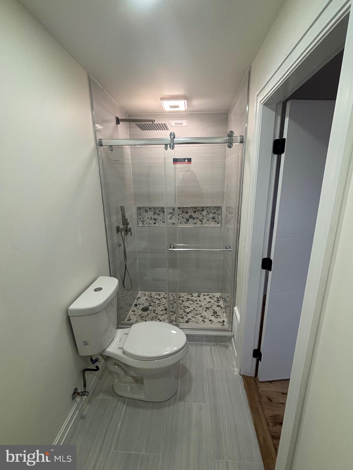 1120 Elm Street, Unit 2F Reading, PA 19604 - Photo 14 of 15 a bathroom with a toilet and a shower