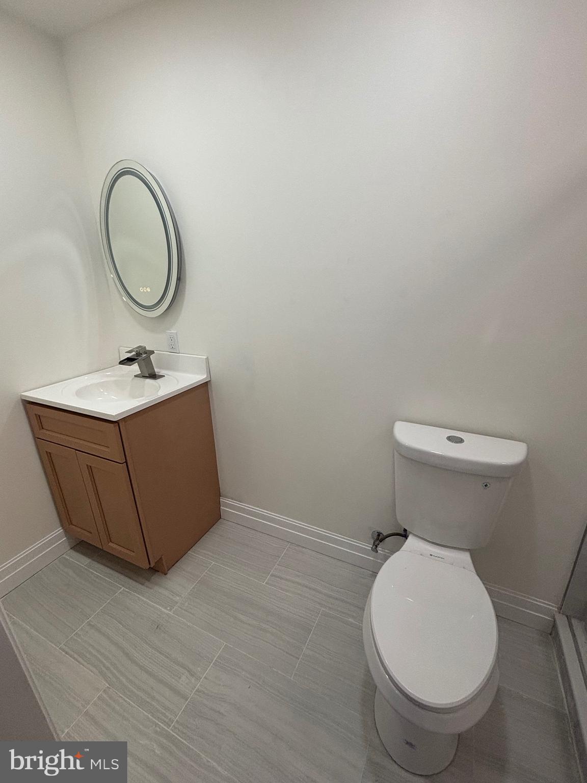 1120 Elm Street, Unit 2F Reading, PA 19604 - Photo 15 of 15 a bathroom with a sink and a toilet