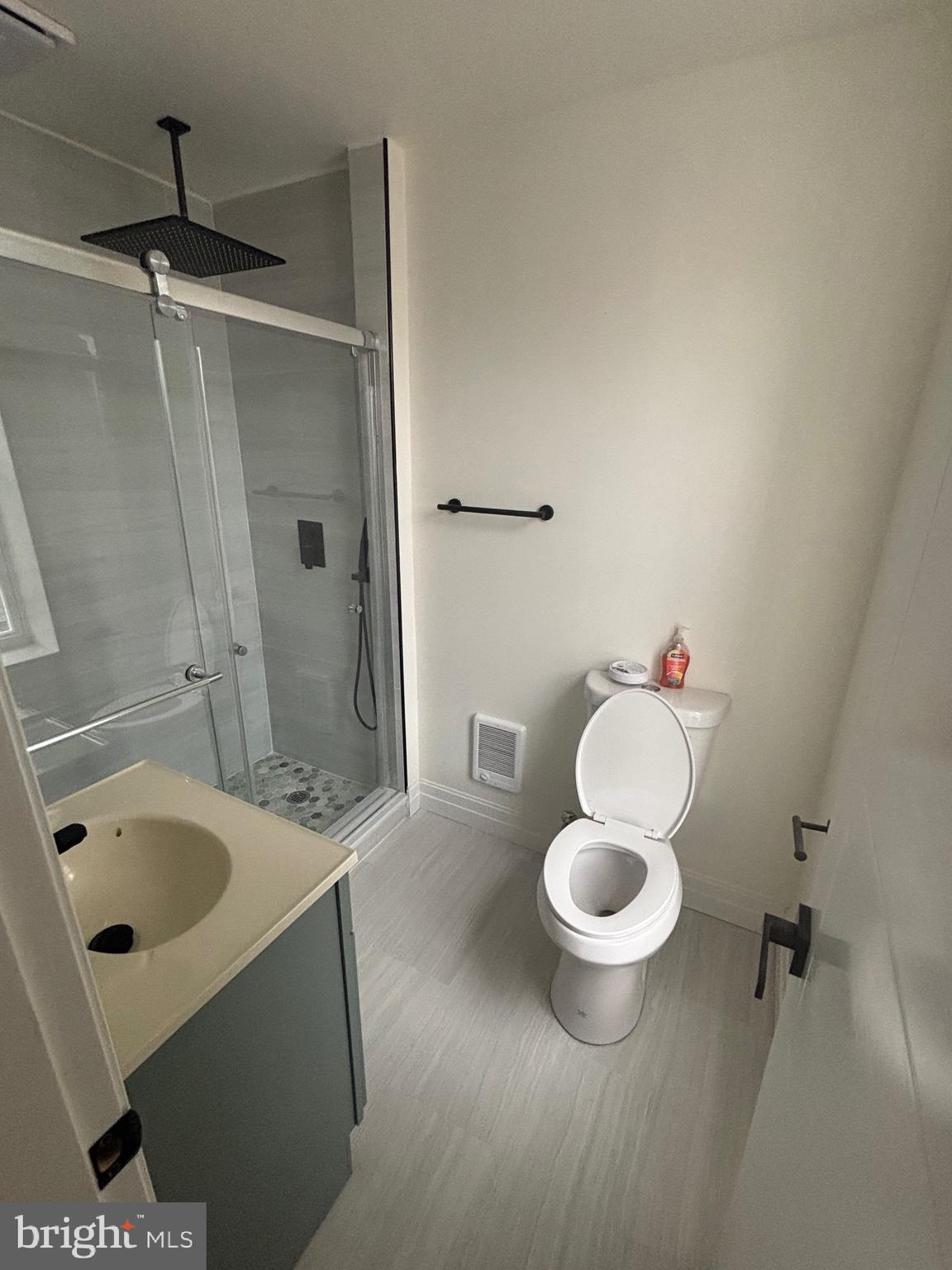 1120 Elm Street, Unit 2F Reading, PA 19604 - Photo 5 of 15 a bathroom with a sink and a toilet