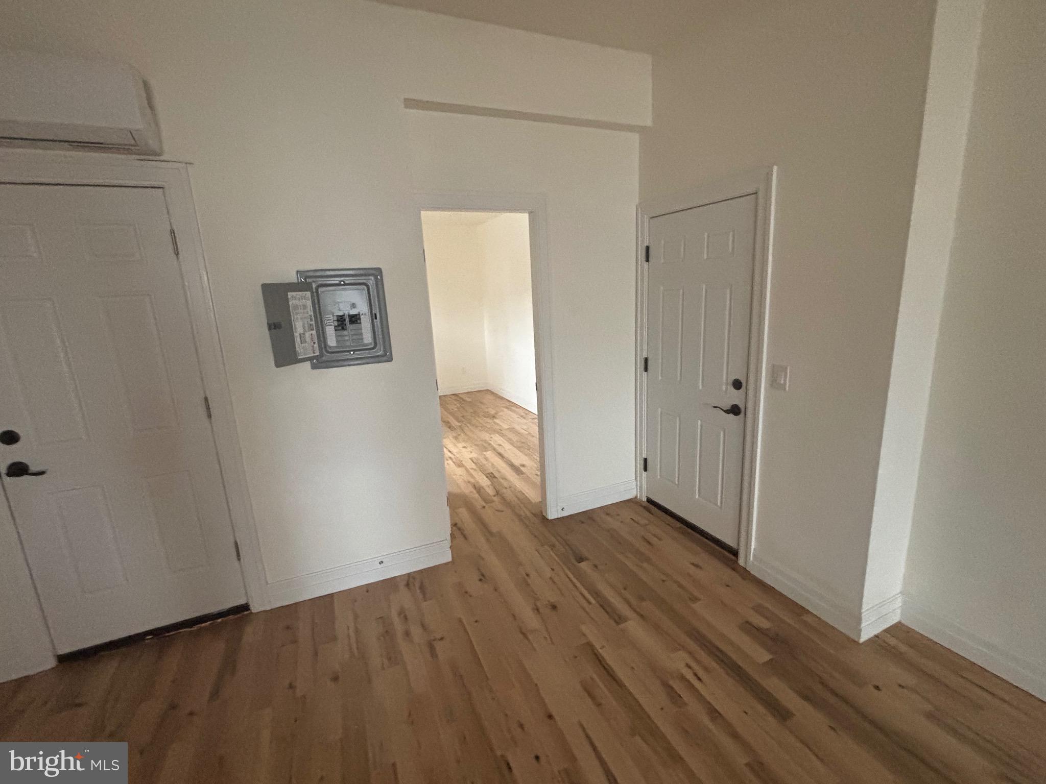 1120 Elm Street, Unit 2F Reading, PA 19604 - Photo 7 of 15 a view of a hallway with wooden floor