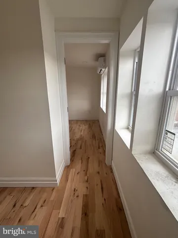 a view of wooden floor and staircase in a room
