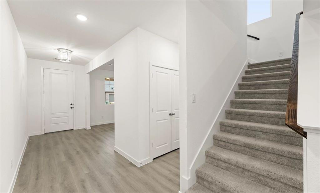 1005 Colgate Circle Princeton, TX 75407 - Photo 13 of 40 a view of an entryway with wooden floor