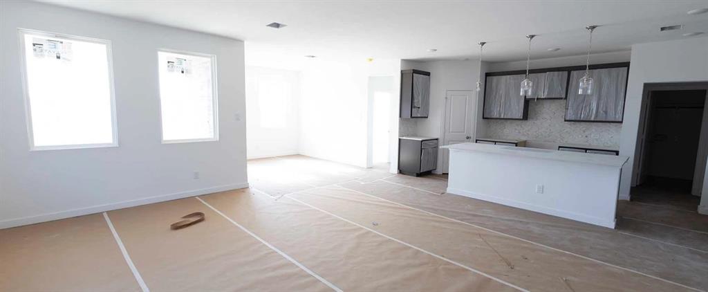 1005 Colgate Circle Princeton, TX 75407 - Photo 14 of 28 Open Kitchen-Living-Dining Room Construction Progress