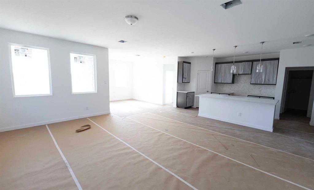 1005 Colgate Circle Princeton, TX 75407 - Photo 4 of 40 a spacious bathroom with a sink and a large mirror