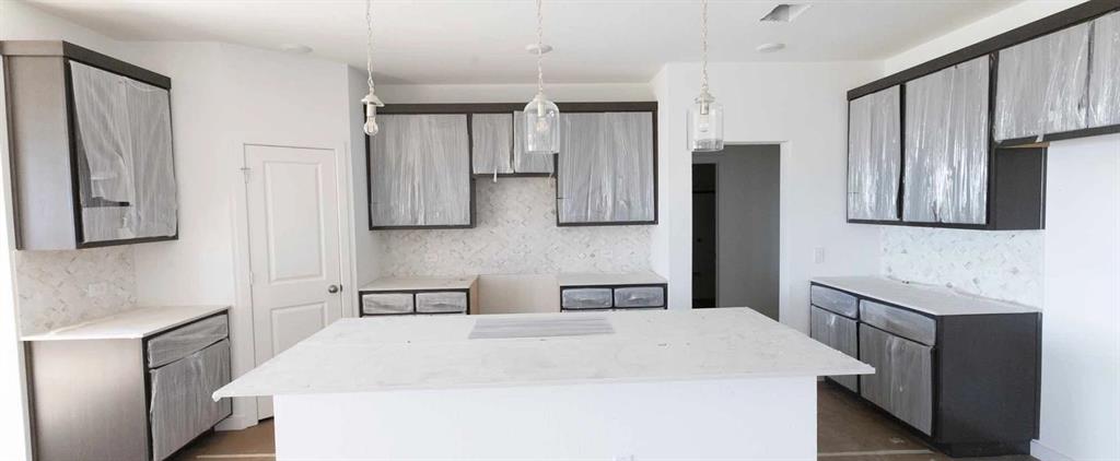 1005 Colgate Circle Princeton, TX 75407 - Photo 9 of 28 Kitchen Construction Progress featuring the Roosevelt Collection