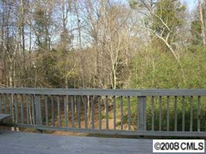 7147 Ramsgate Road Charlotte, NC 28270 - Photo 8 of 8 a view of a wooden fence