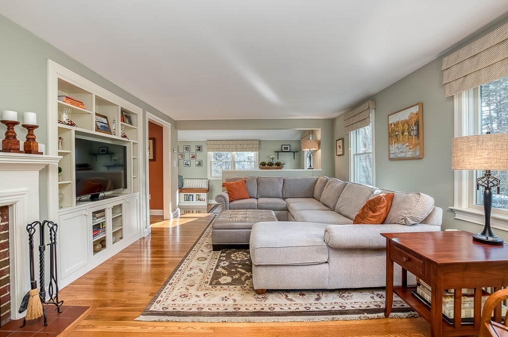 41 Millbrook Road Westwood, MA 02090 - Photo 17 of 42 a living room with furniture and a flat screen tv