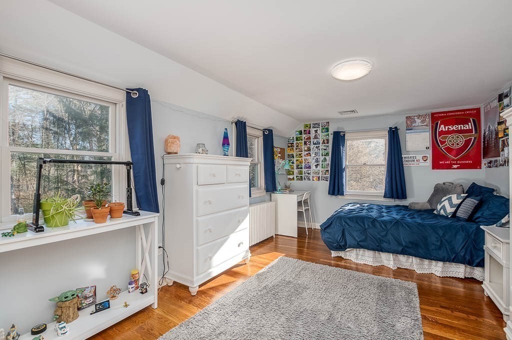 41 Millbrook Road Westwood, MA 02090 - Photo 26 of 42 a living room with furniture and a window