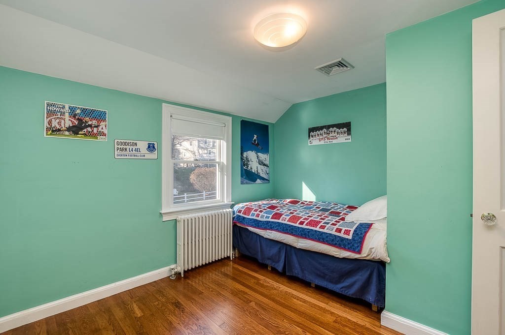 41 Millbrook Road Westwood, MA 02090 - Photo 28 of 42 a bedroom with a bed and a window