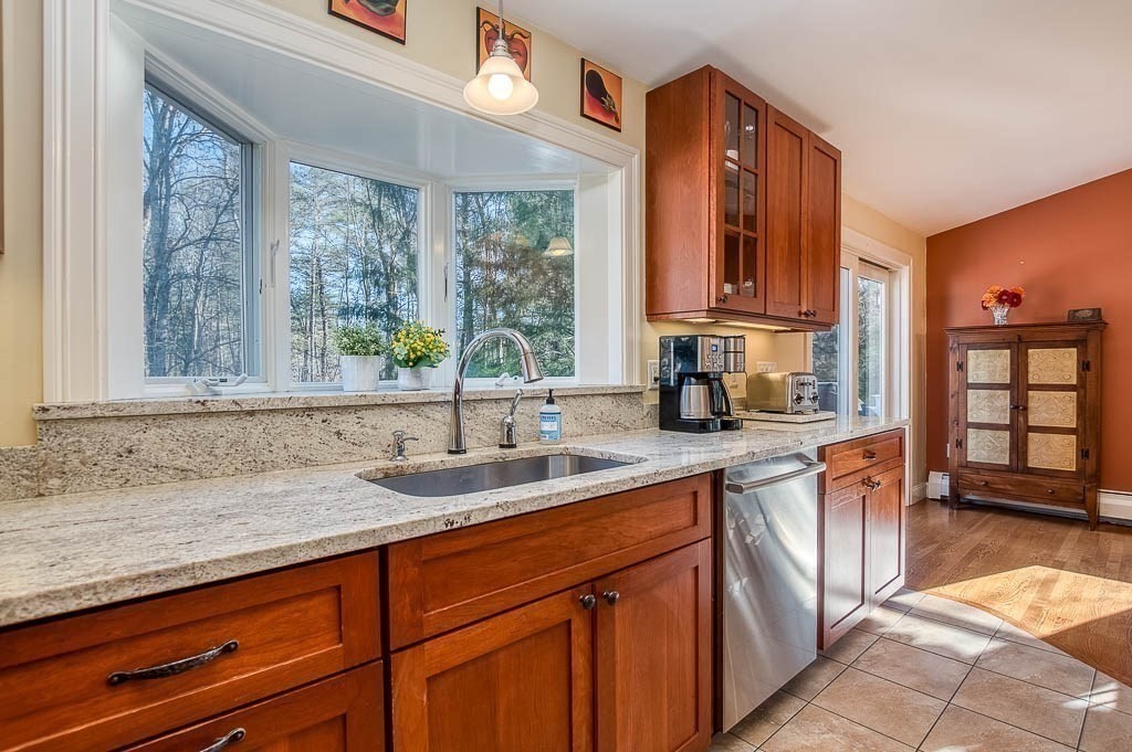 41 Millbrook Road Westwood, MA 02090 - Photo 7 of 42 a kitchen with granite countertop a sink and a window