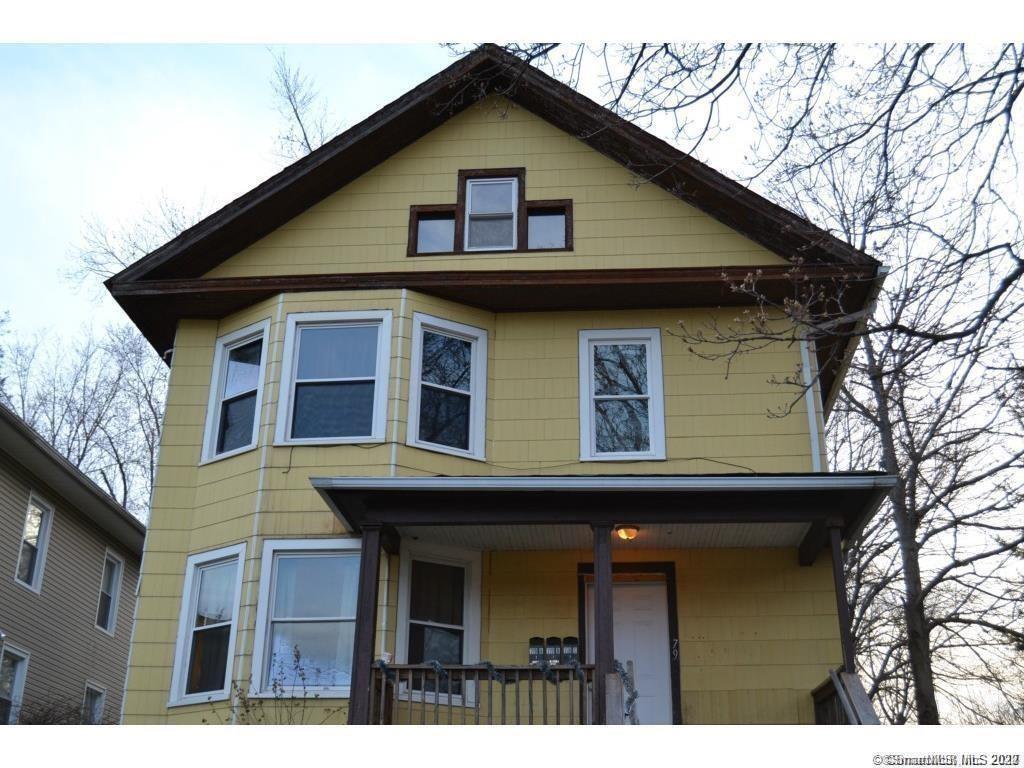 79 East Main Street Middletown, CT 06457 - Photo 1 of 1 a front view of a house with a wooden fence