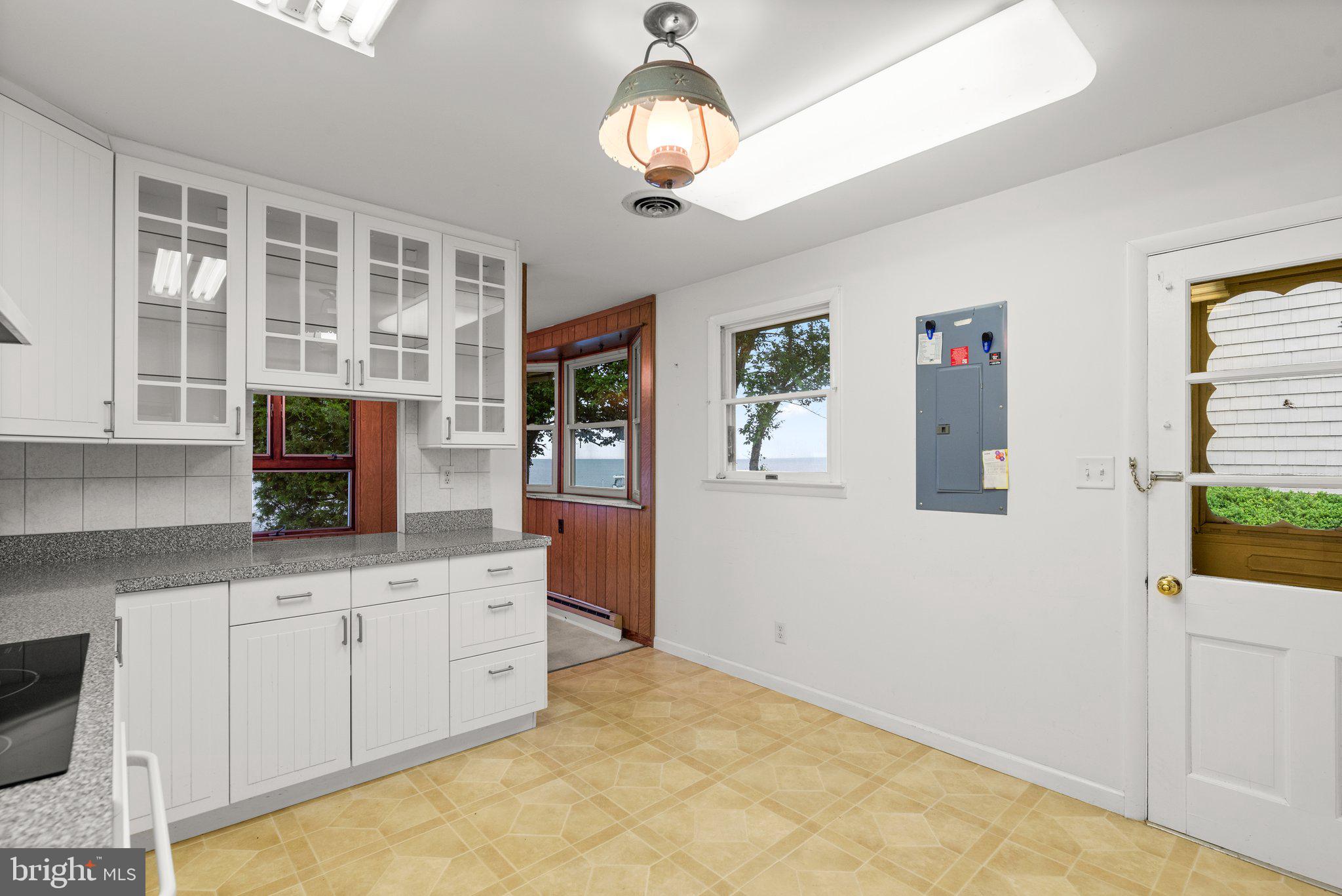 802 Kentmorr Road Stevensville, MD 21666 - Photo 23 of 62 Glass Cabinetry/Pass-Through to Breakfast Nook