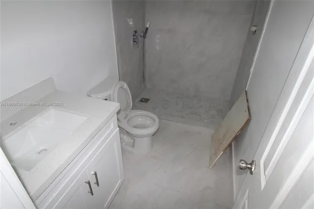 a view of small space with wooden floor