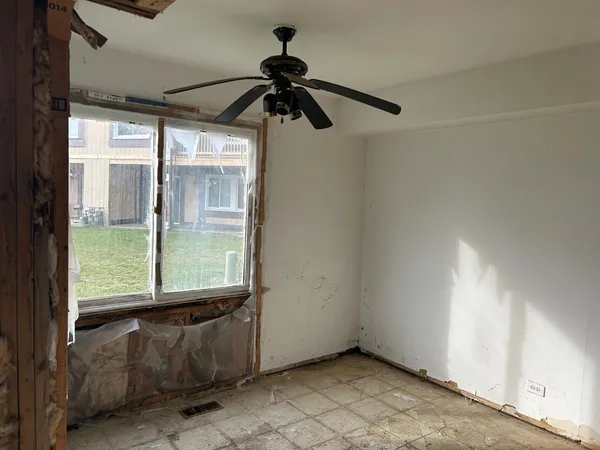 a view of a hallway with staircase