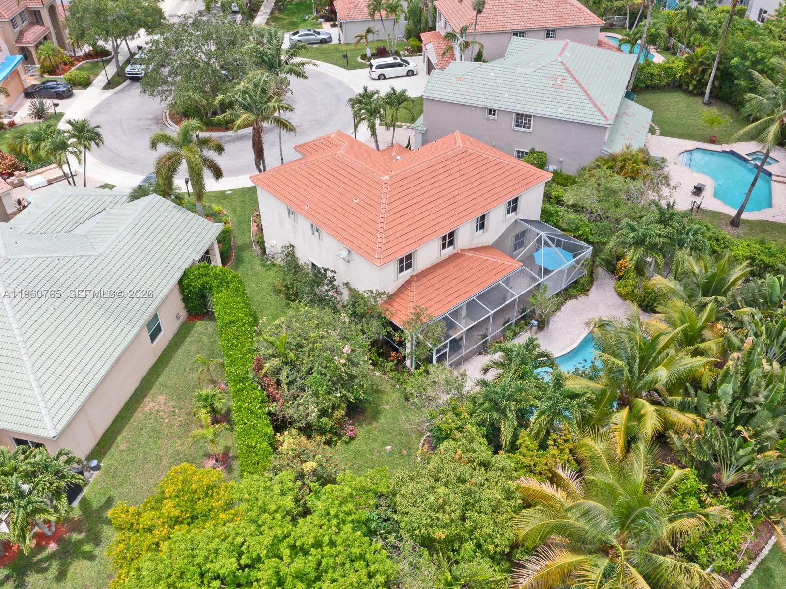 4209 Pinewood Lane Weston, FL 33331 - Photo 69 of 85 an aerial view of a house with yard