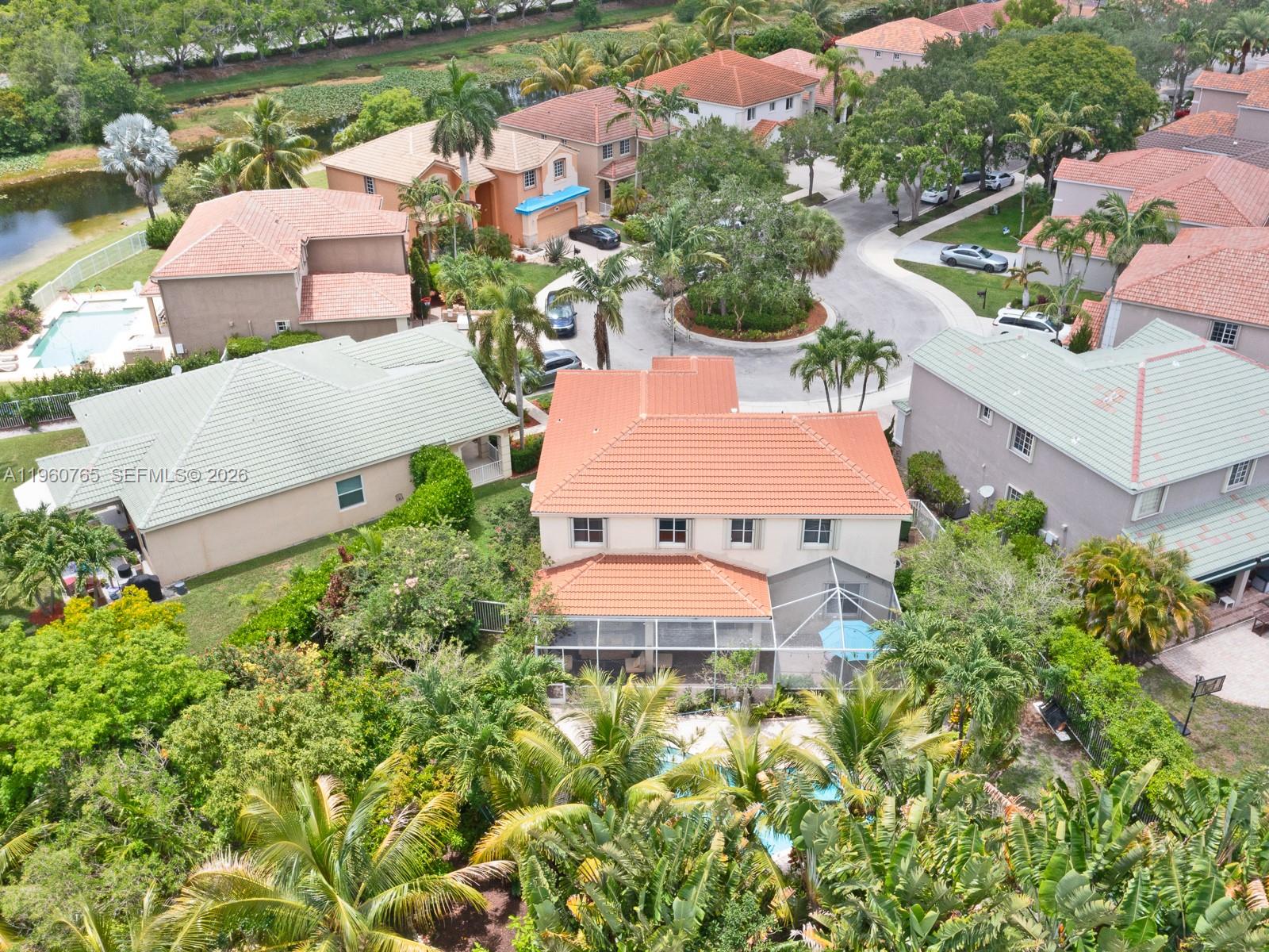 4209 Pinewood Lane Weston, FL 33331 - Photo 70 of 85 an aerial view of house with yard swimming pool and outdoor seating