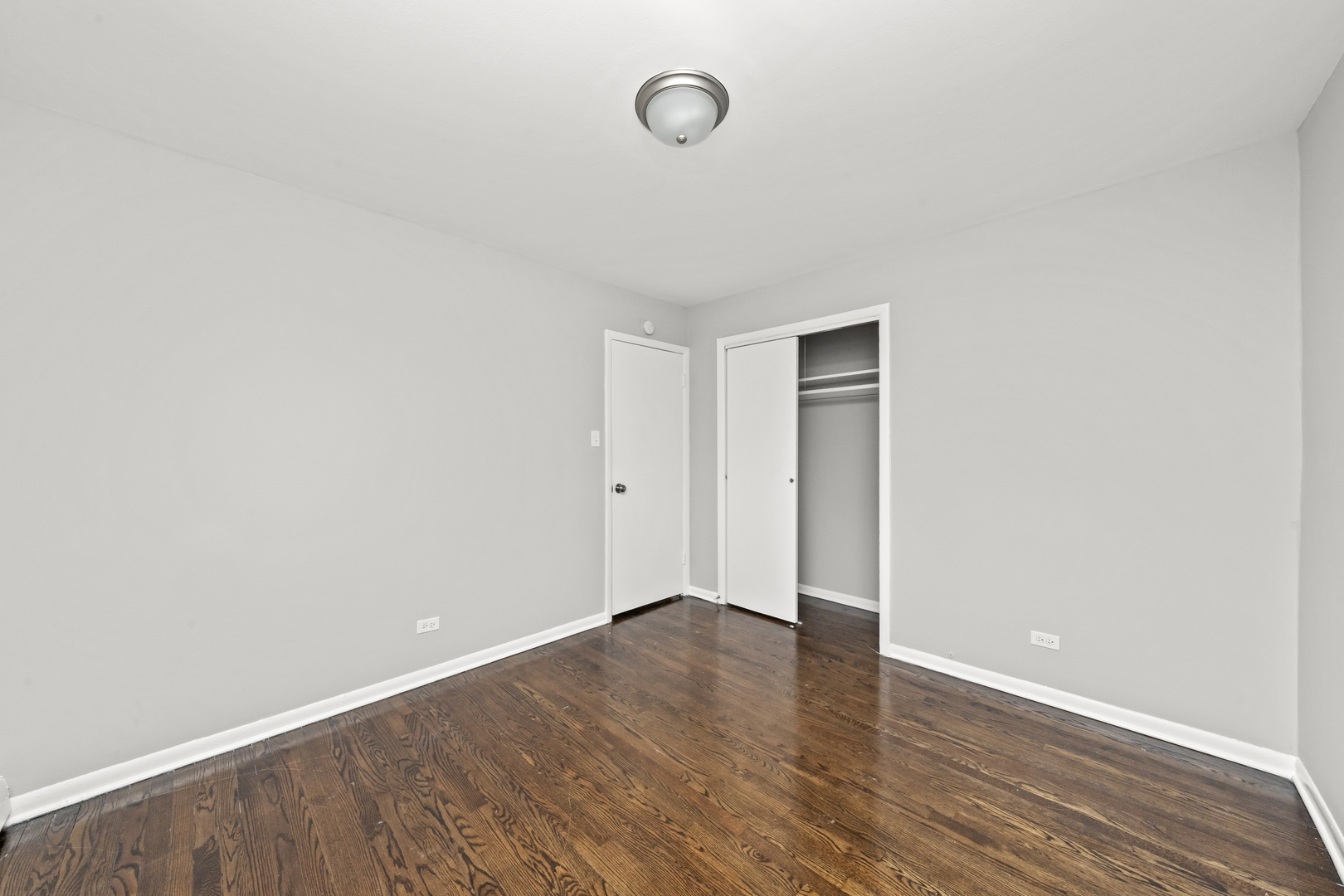 14618 Keystone Avenue Midlothian, IL 60445 - Photo 6 of 6 a view of an empty room with wooden floor