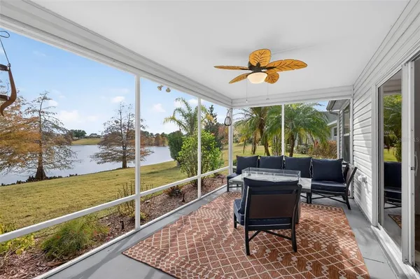 a view of a swimming pool with a patio