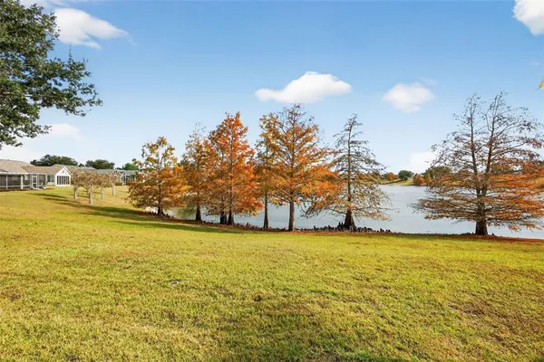 a house with river in front of it