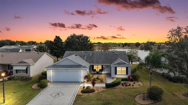 an aerial view of a house with garden space
