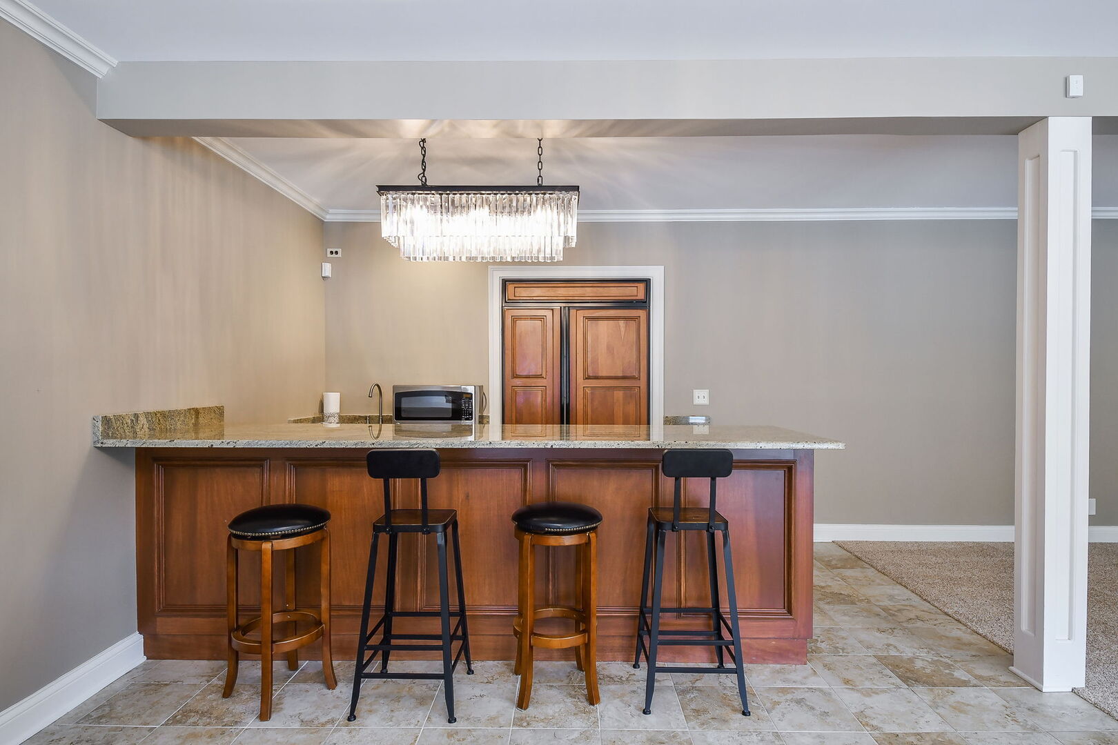 34W791 Army Trail Road Wayne, IL 60174 - Photo 47 of 65 a kitchen with stainless steel appliances a table and chairs in it