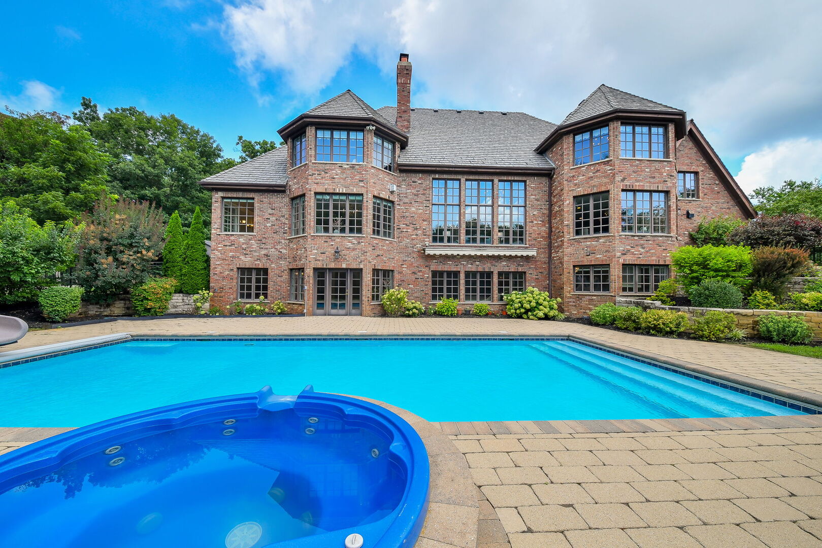 34W791 Army Trail Road Wayne, IL 60174 - Photo 55 of 65 a front view of a house with swimming pool