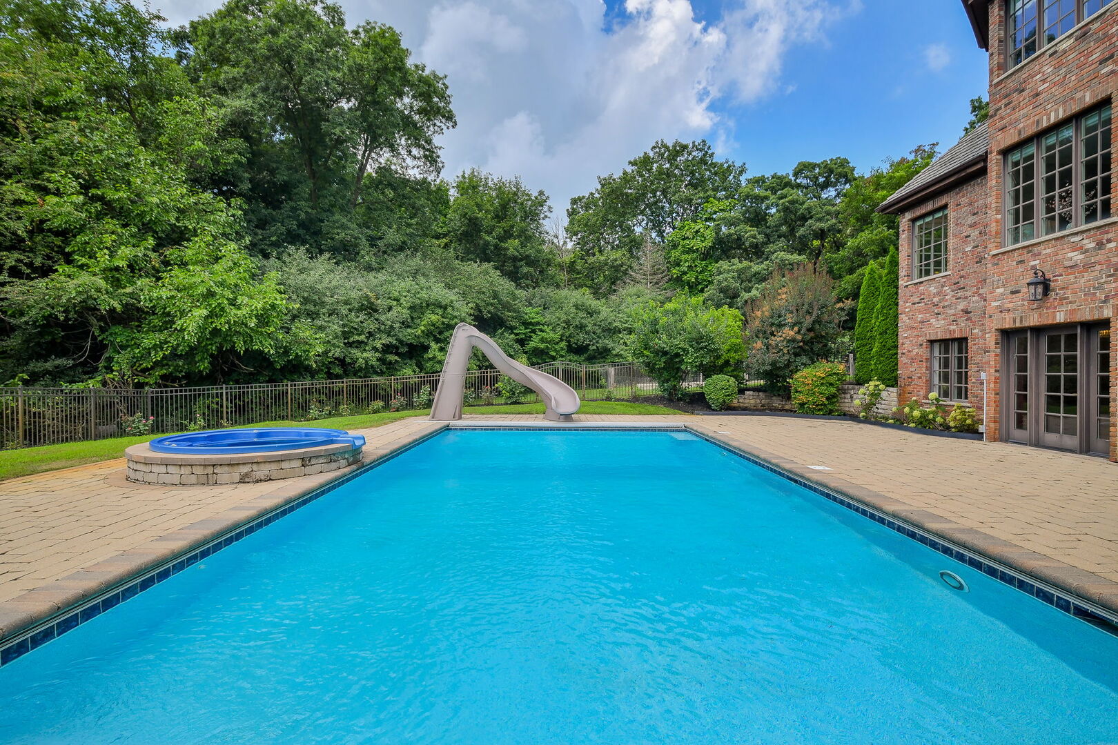 34W791 Army Trail Road Wayne, IL 60174 - Photo 57 of 65 a view of a swimming pool with lounge chair